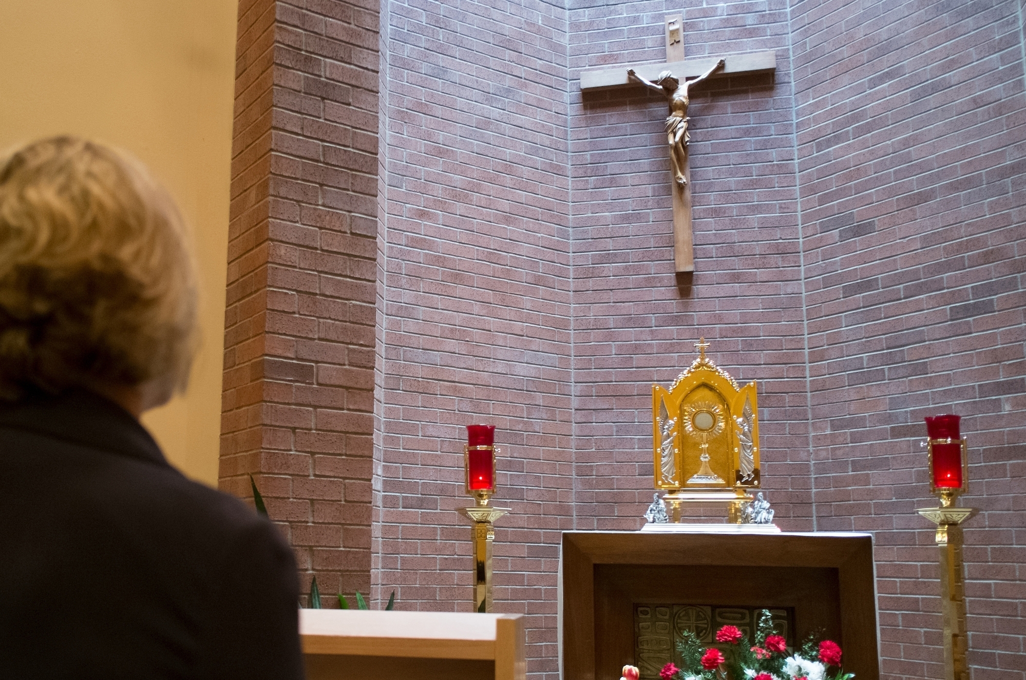 Carol Loya is pictured at Holy Family Church in Kirkland, Washington Thursday January 16, 2014. (PHOTO by Stephen Brashear) Adoration, Chapel, Monstrance, Tabernacle, prayer