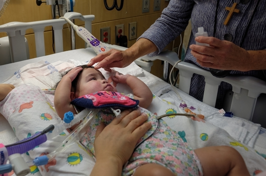 Camillus Ministry at Seattle Children's Hospital on Friday, September 27, 2019 in Seattle. (PHOTO by Stephen Brashear), baby