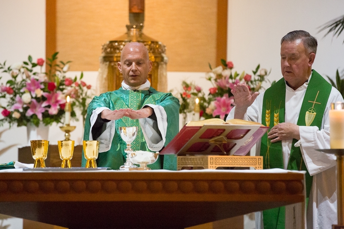 Father Cal consecration photo from the Called to Serve As Christ campaign.