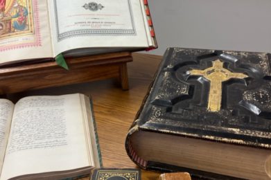 Books displayed on wooden table.