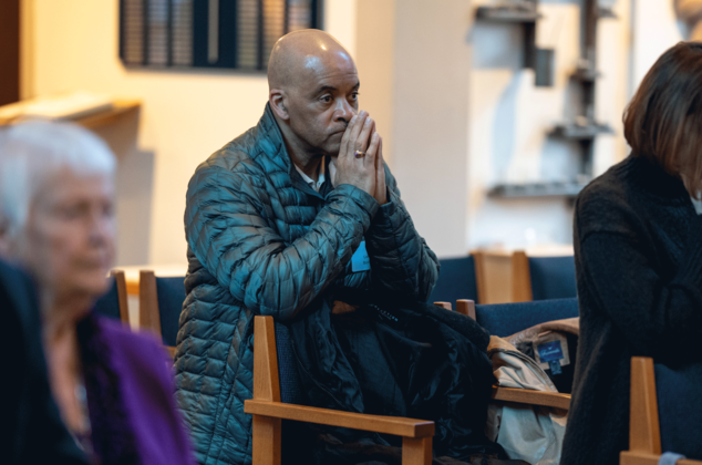 A man praying at the 2024 Crozier Lenten Retreat