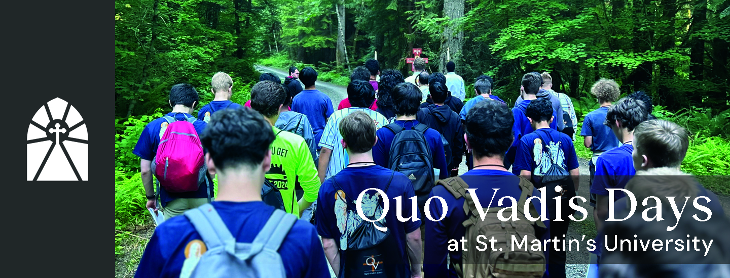 Young men walking down a path in the woods